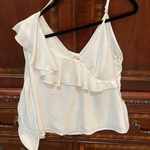 Essue One sleeve white top.